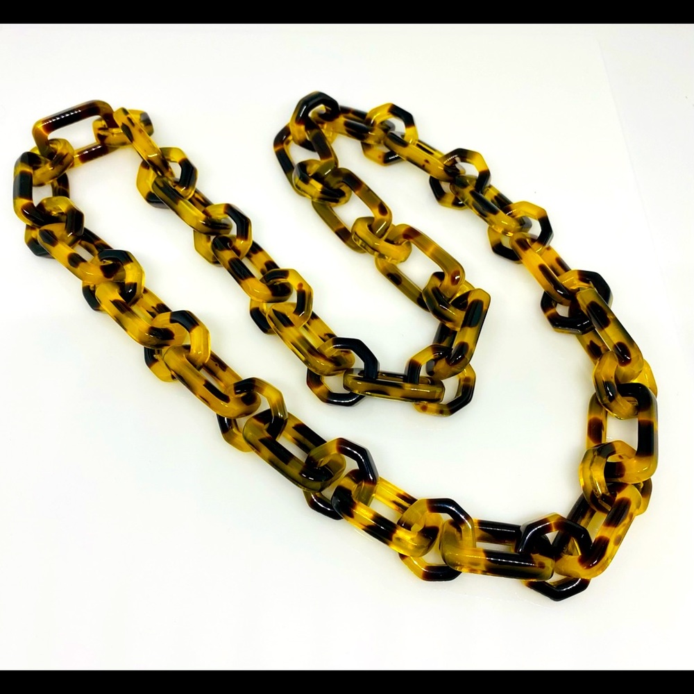 Tortoise Necklace retailed by J. Crew.